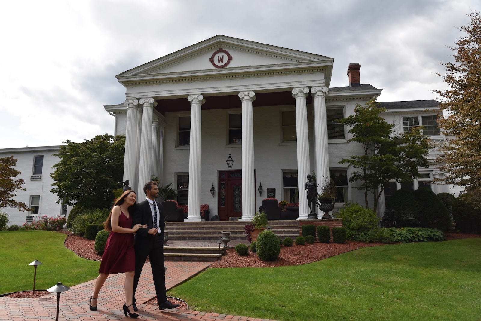 One of the best Things to do in Pennsylvania for Couples is stay at Tara, a happy couple walking on the sweeping grounds 